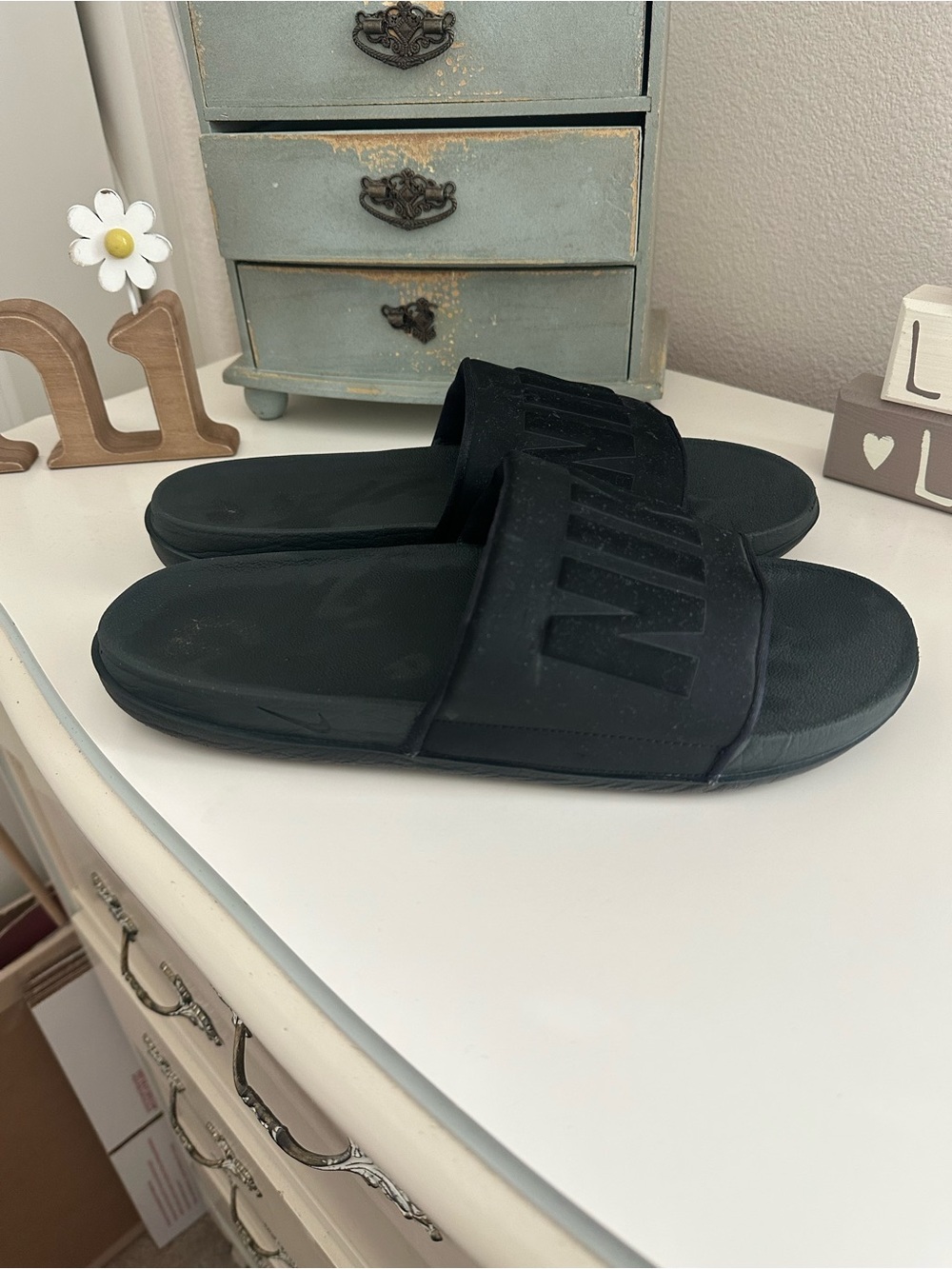 Nike Kids Black Slide Sandals with Embossed Logo